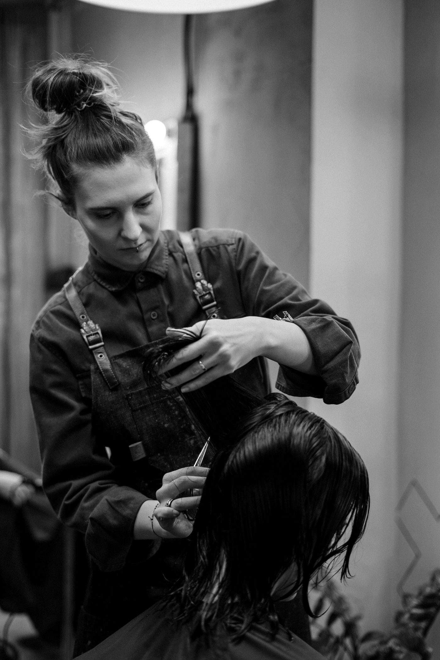 Stylist working through a precision cut