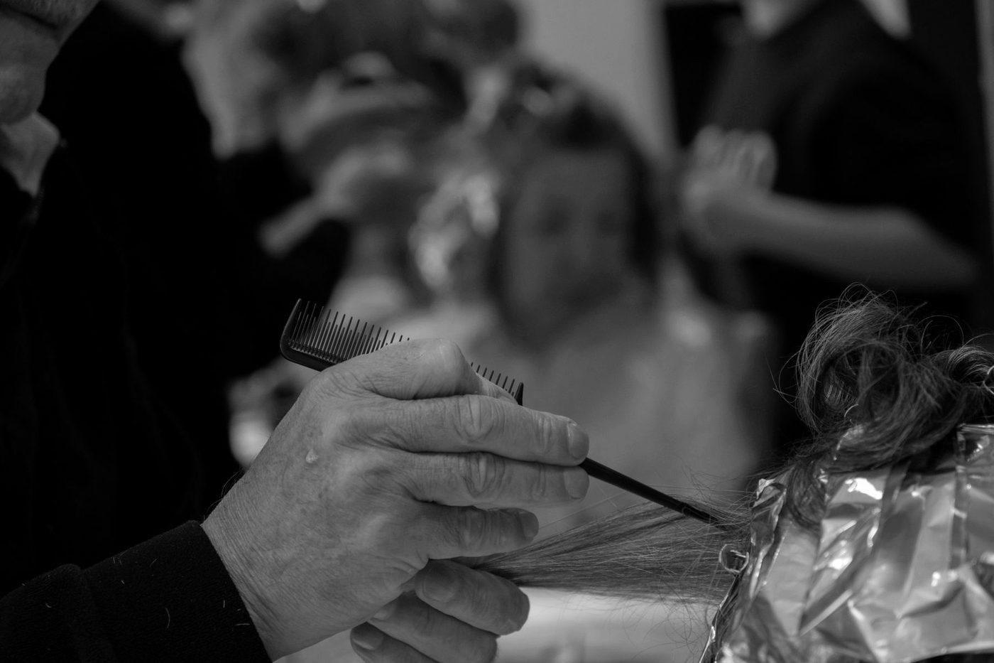 Foils folded through hair mid-color