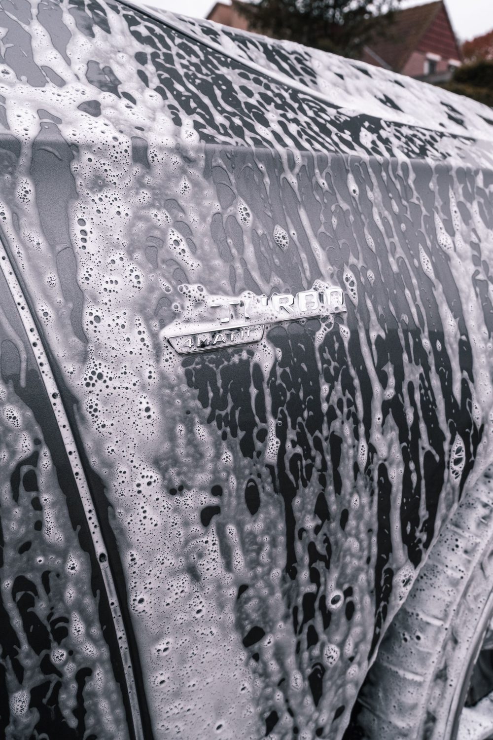 Foam over an emblem in black and white
