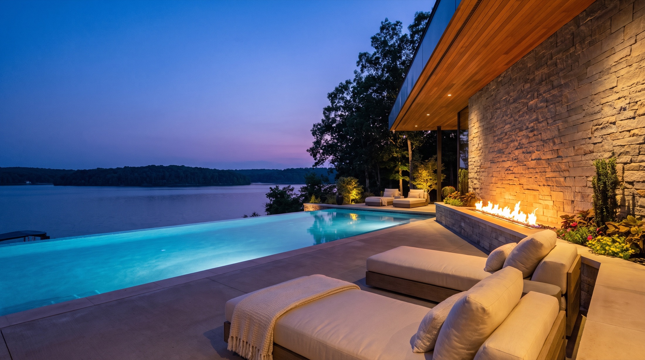 Infinity pool merging with the lake at dusk